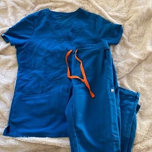 Figs XS Alps Blue set. Top - Casma 3 pocket XS. Bottom- Yola Skinny XS Regular.